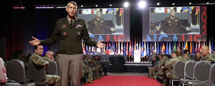 General Hokanson briefing the state of the National Guard during 2nd business session.